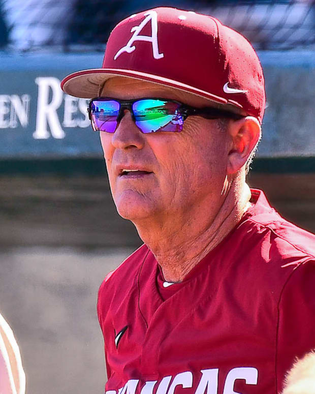 Razorbacks coach Dave Van Horn in dugout in 11-4 loss to Little Rock on Wednesday afternoon.
